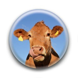 Badge Vache tirant la langue