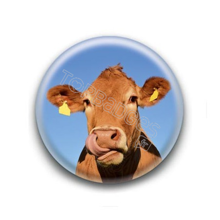 Badge Vache tirant la langue