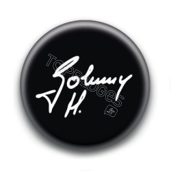 Badge : Johnny H, signature fond noir