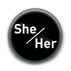 Badge : She / Her