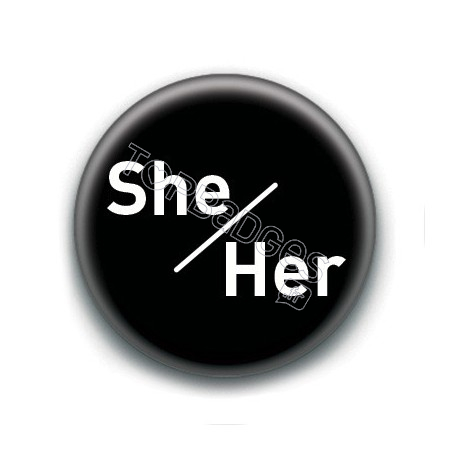 Badge : She / Her