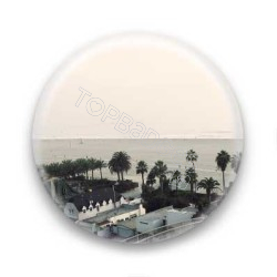 Badge entre ciel et eau