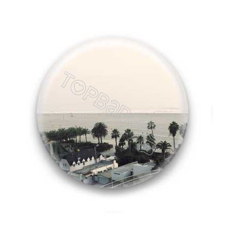 Badge entre ciel et eau