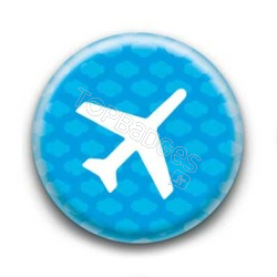 Badge Avion sur Fond Nuageux