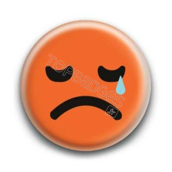 Badge : Smiley triste orange