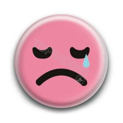 Badge : Smiley triste rose